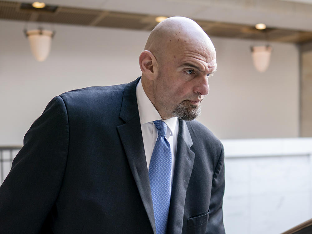 Sen. John Fetterman, D-Pa., is pictured at the Capitol in Washington, D.C., on Feb. 14. Fetterman was discharged from Walter Reed hospital on Friday after being treated for depression, which is now in remission, his office said.