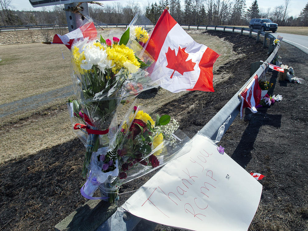 A memorial pays tribute to Royal Canadian Mounted Police Constable Heidi Stevenson, a mother of two and a 23-year veteran of the force, along the highway in Shubenacadie, Nova Scotia, on Tuesday, April 21, 2020.
