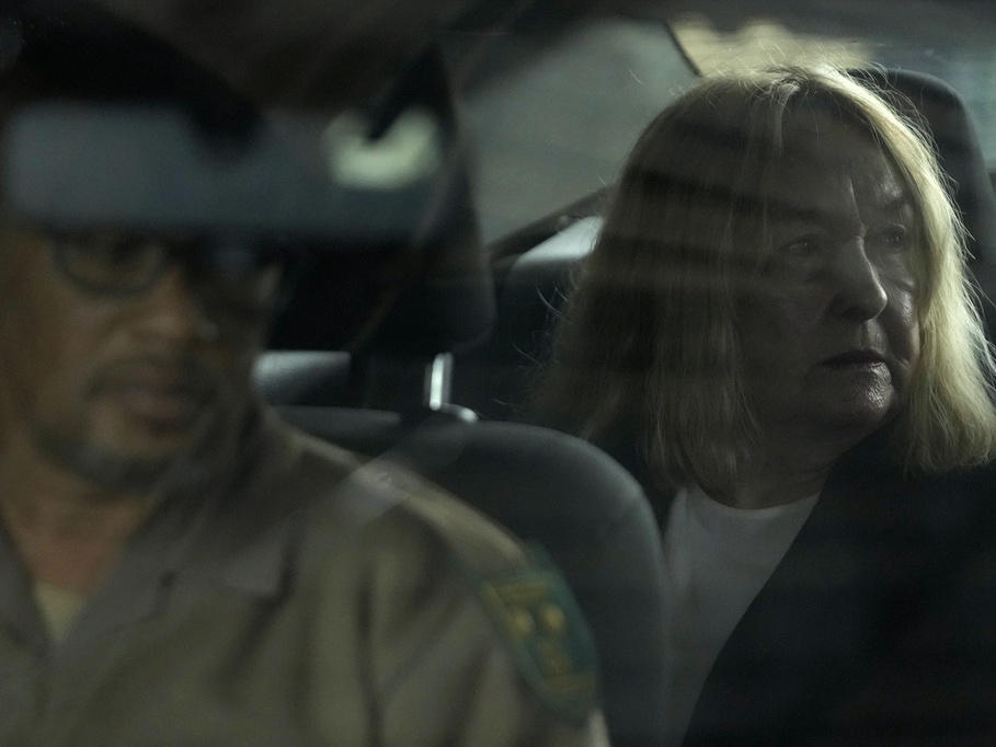June Steenkamp, the mother of Reeva Steenkamp sits inside the correctional service car Thursday at the Atteridgeville Prison for the parole hearing of Oscar Pistorius in Pretoria, South Africa.