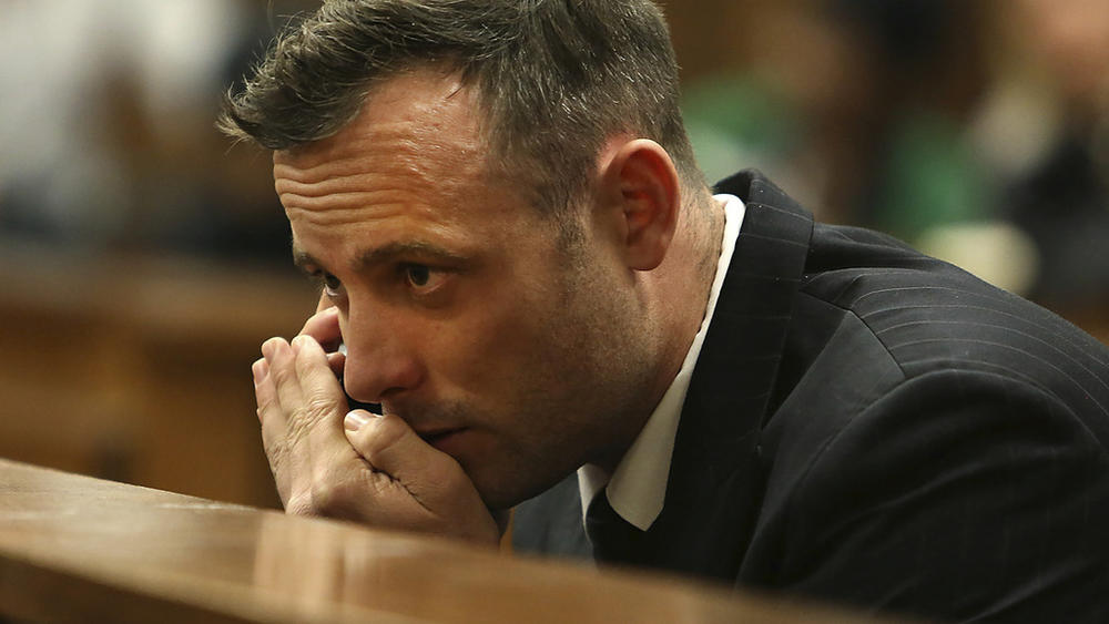 Oscar Pistorius speaks on a mobile phone in June 2016 during his sentencing hearing for murdering girlfriend Reeva Steenkamp in the High Court in Pretoria, South Africa.