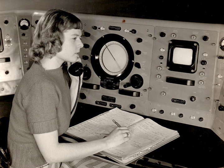 Virginia Norwood sits at the Storm Detector Radar Set at the Army Signal Corps Laboratories in New Jersey in a photo displayed at the Institute for Radio Engineers Convention, Spring 1950.