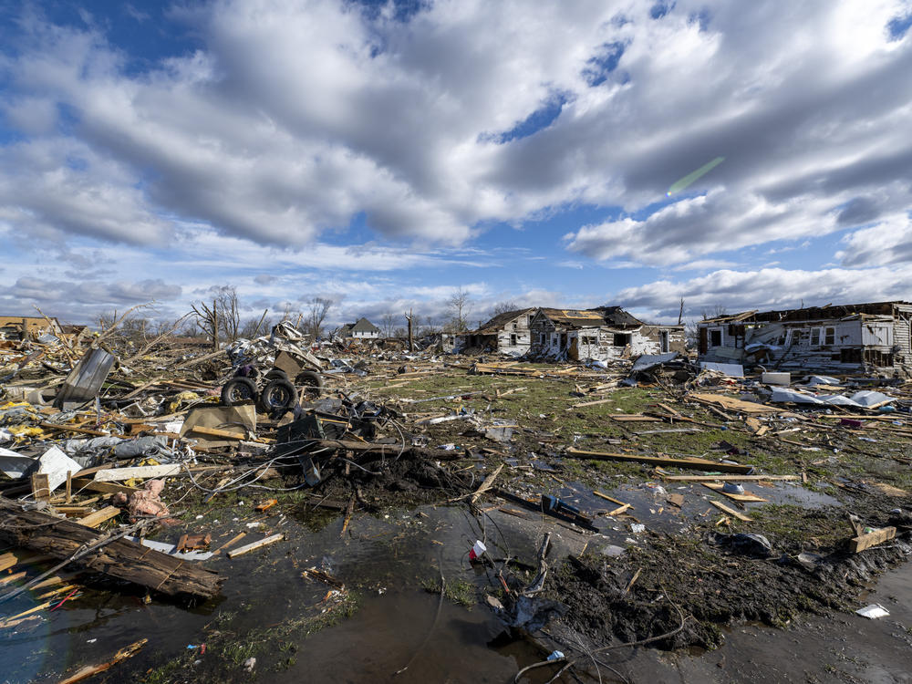 Damage from a late-night tornado is seen in Sullivan, Ind., Saturday. Multiple deaths were reported in the area following the storm.