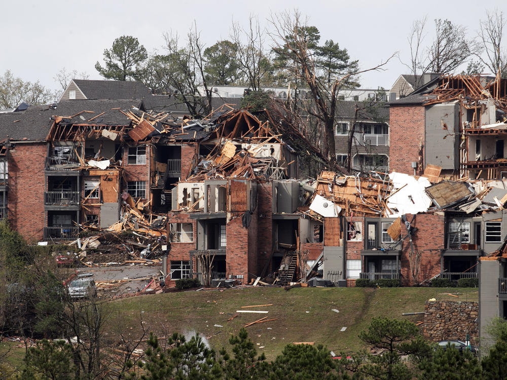The remains of an apartment complex damaged by a tornado are seen on Friday in Little Rock.