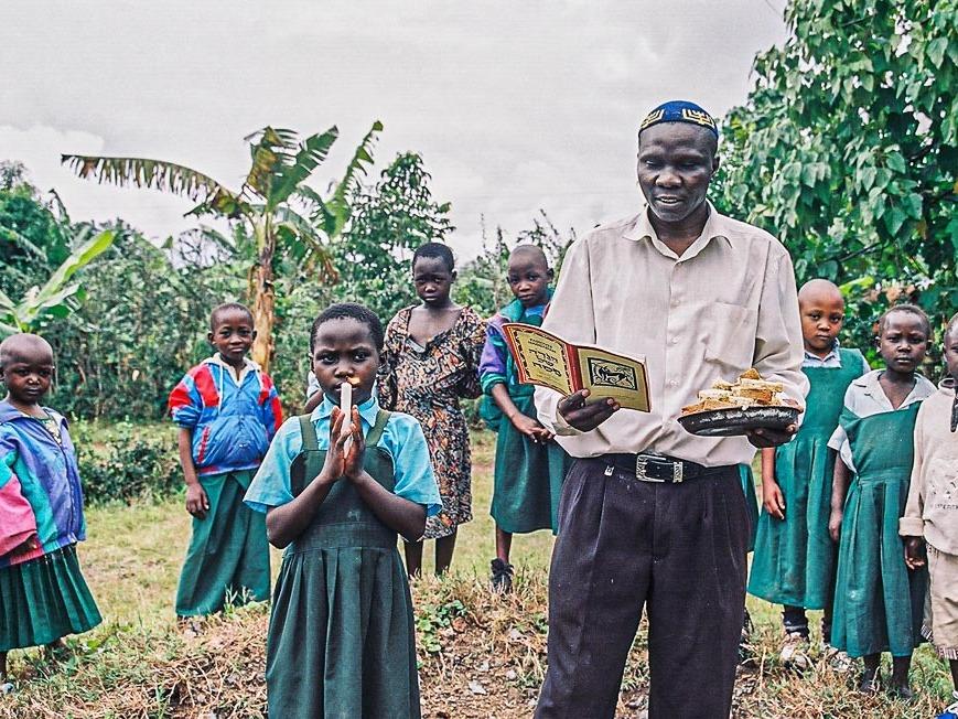 Members of the Abayudaya Jewish community of Uganda engage in the ritual of burning leavened foods before the Jewish holiday of Passover. There are some 2,500 Abayudaya Jews in the country. In the past they have faced persecution for their beliefs but are steadfast in their commitment to Judaism.