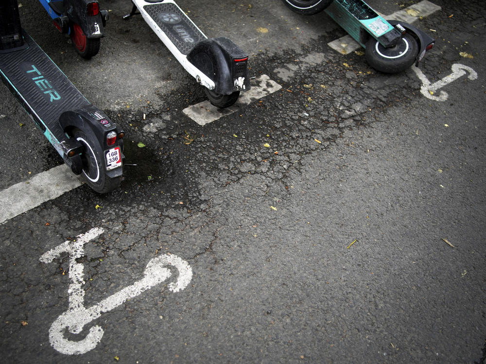 Scooters are parked in Paris, Friday, March 31, 2023.