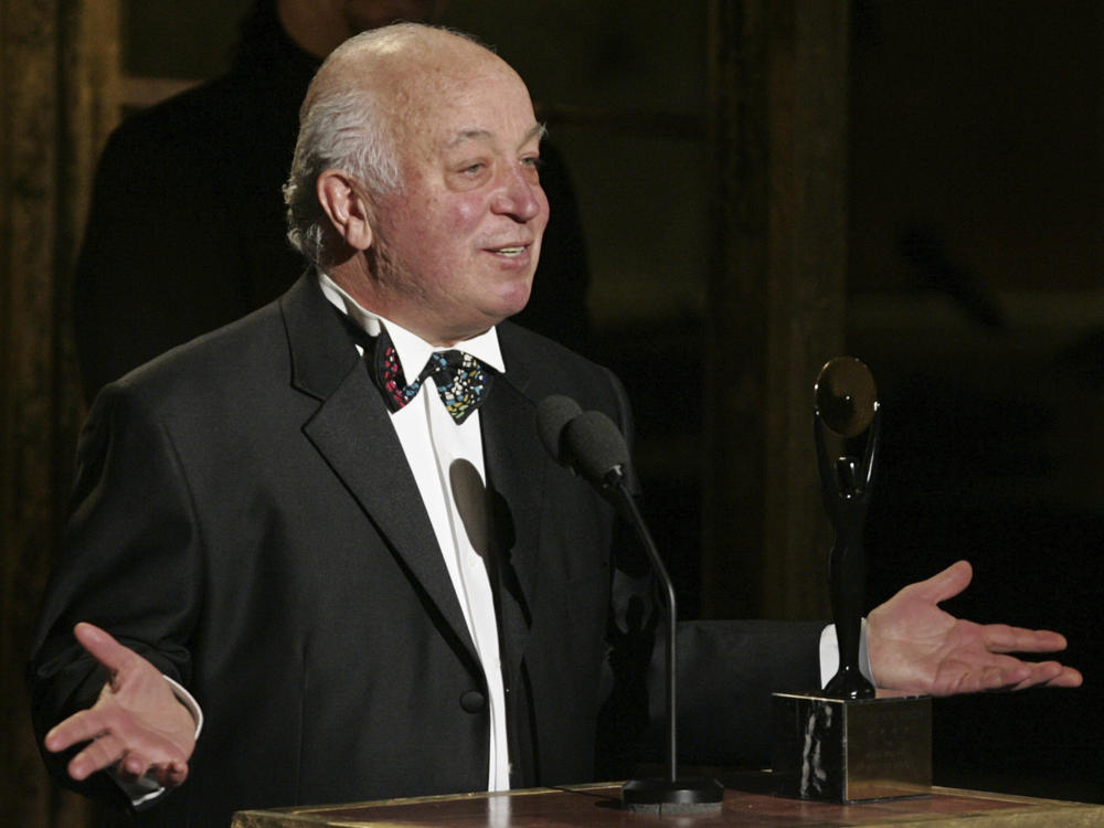 Seymour Stein accepts his award during the Rock and Roll Hall of Fame induction ceremony, Monday, March 14, 2005, in New York.