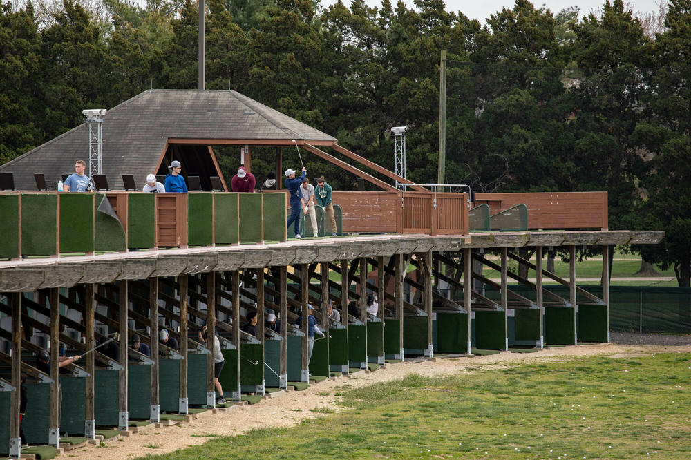 How far can you go? People at the East Potomac Golf Links give it their best shot.