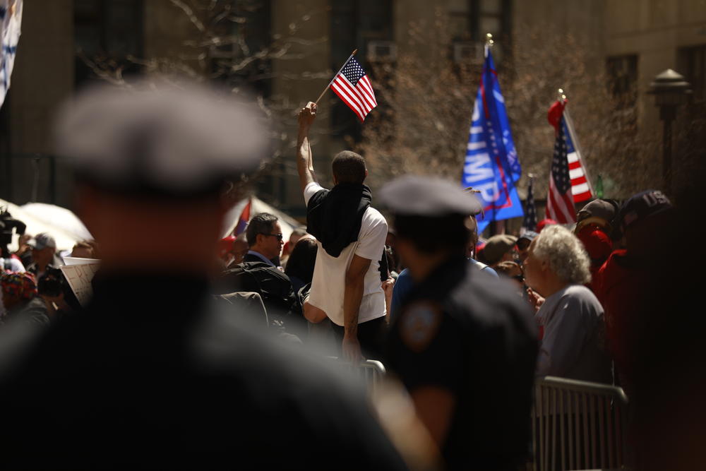 As supporters of the former president protest at Collect Pond Park, NYPD place barricades separating anti-Trump protestors from supporters on the morning of as Donald J. Trump's scheduled surrender at the Manhattan Criminal Courts Building in New York City.