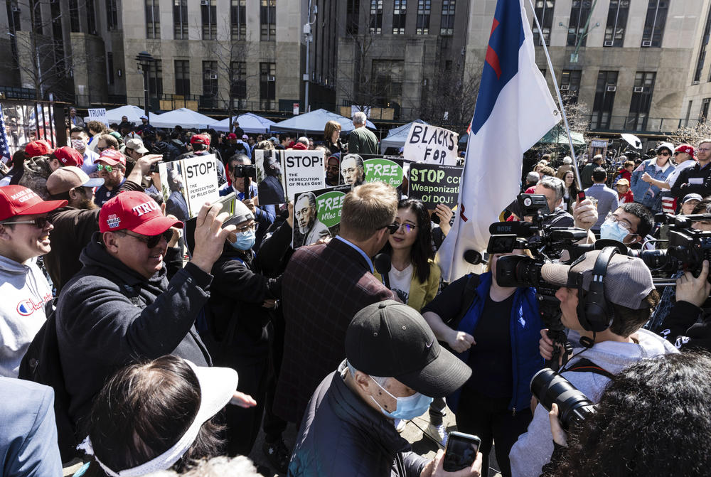 People gather at a protest held in Collect Pond Park across the street from the Manhattan District Attorney's office in New York on Tuesday, April 4, 2023.