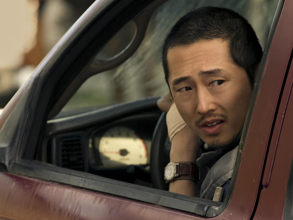 Steven Yeun as Danny, who may regret following that car.