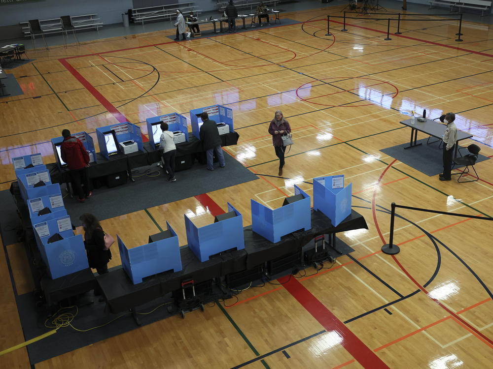 Georgia voters cast their ballots in a U.S. Senate runoff election on Dec. 6, 2022, in Norcross, Ga.