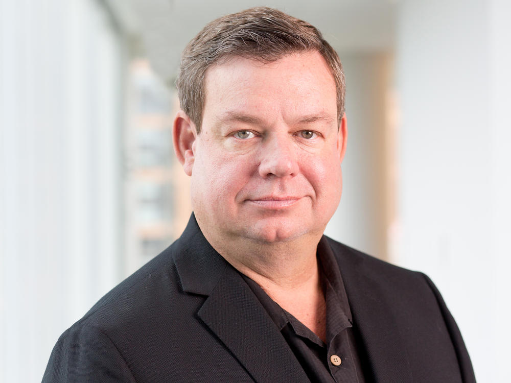 Wade Goodwyn reported for NPR for three decades and was known for his deep Texas bass and keen reporting observations and sharp writing. He's pictured here at NPR headquarters in Washington, D.C., in 2018.