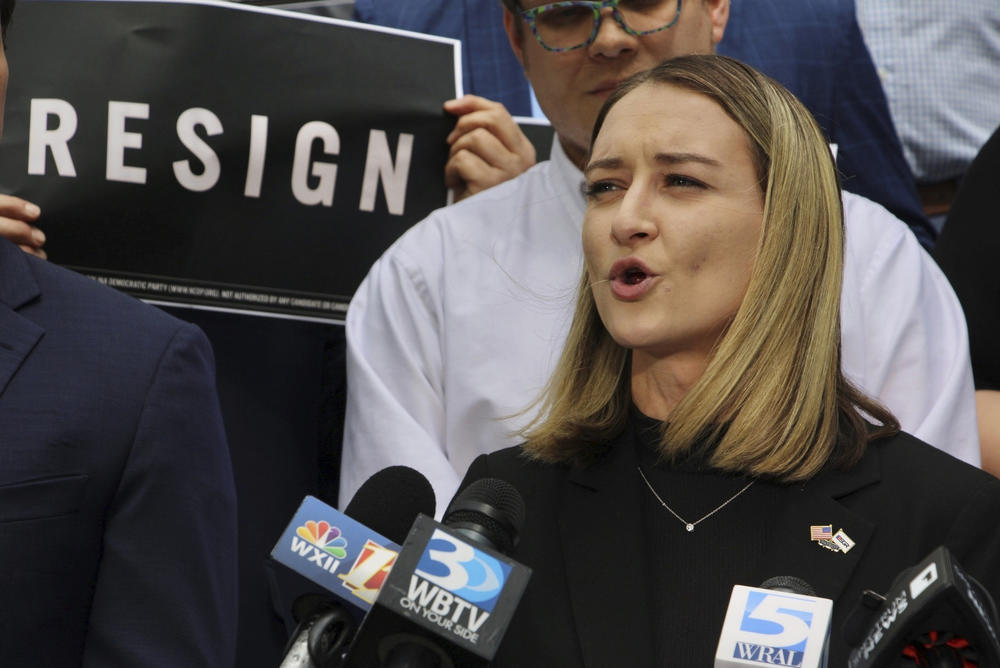 North Carolina Democratic Party Chair Anderson Clayton speaks at a rally calling for state Rep. Tricia Cotham's resignation.