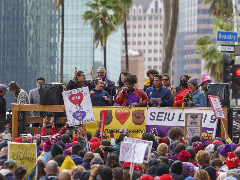 Union leaders address thousands of Los Angeles Unified School District teachers and Service Employees International Union 99 members during a rally outside the LAUSD headquarters in Los Angeles on March 21, 2023.