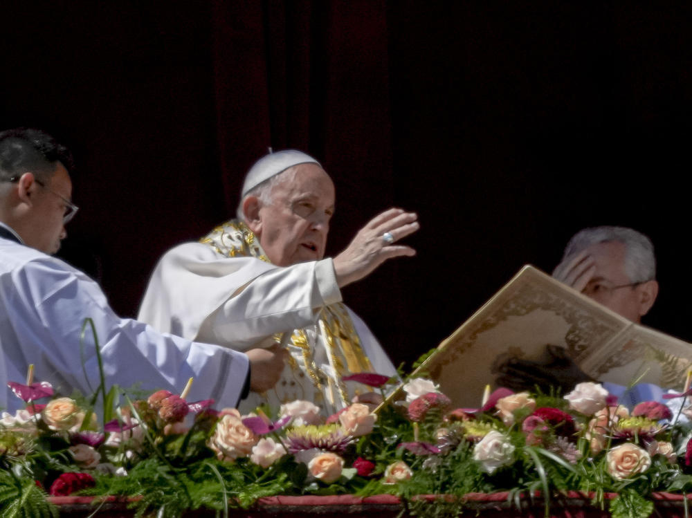 Pope Francis bestows the plenary 'Urbi et Orbi' (to the city and to the world) blessing from the central lodge of the St. Peter's Basilica at The Vatican at the end of 2023'S Easter Sunday mass.