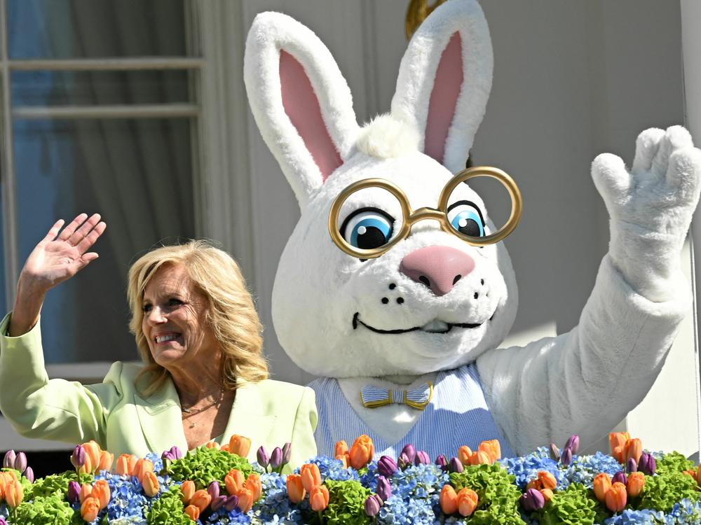 First lady Jill Biden, alongside the Easter Bunny waves at the annual Easter Egg Roll.
