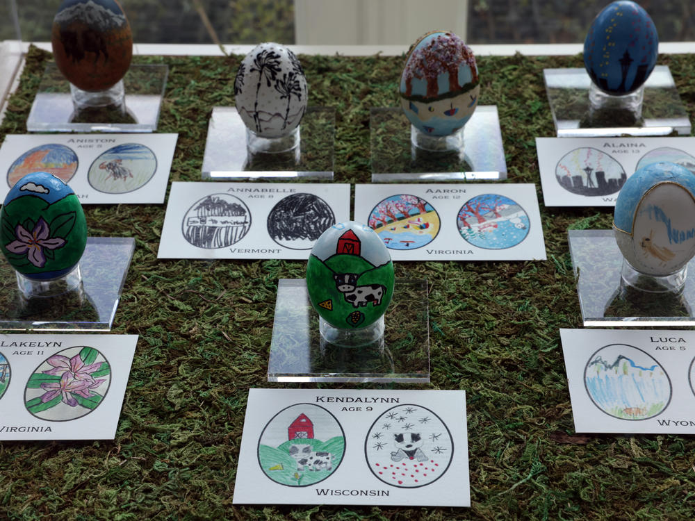 Easter eggs designed by students from all 56 states and territories are on display at the East Colonnade of the White House.
