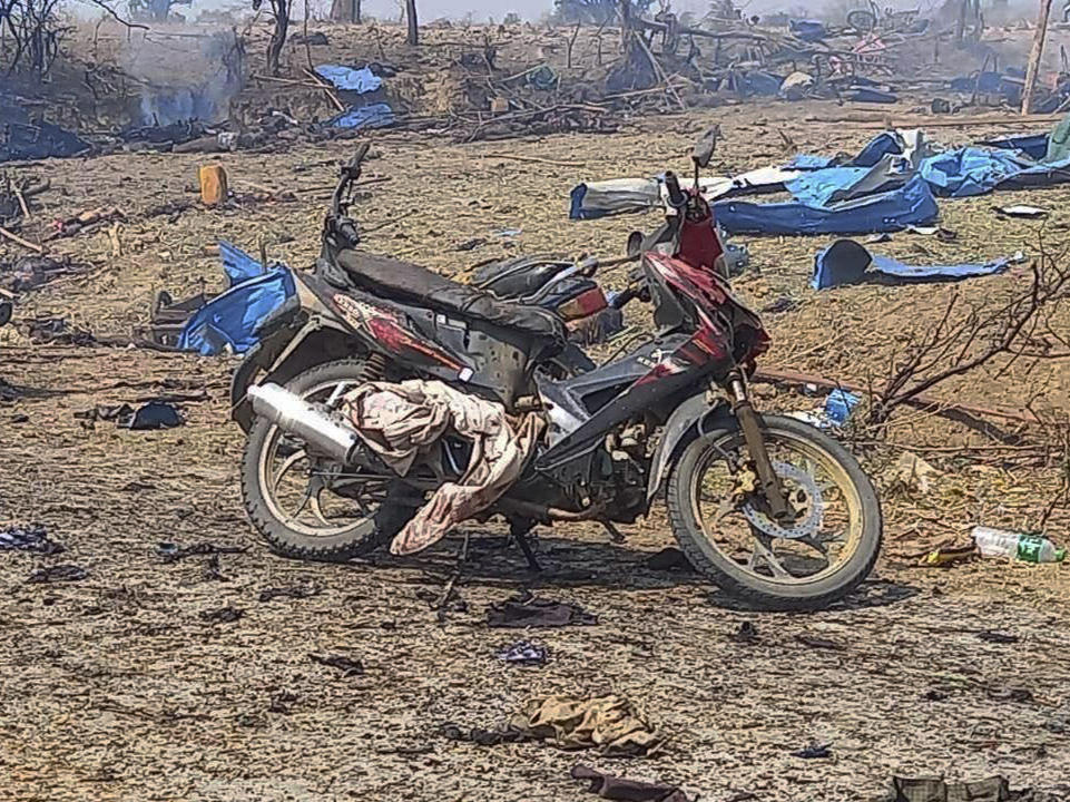 This photo provided by the Kyunhla Activists Group shows aftermath of an airstrike in Pazigyi village in Sagaing Region's Kanbalu Township, Myanmar, on Tuesday.