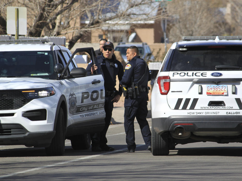 Police work outside of a home in Albuquerque, N.M., on Feb. 23. Critics say problems with training are attributed to higher levels of police killings in New Mexico.