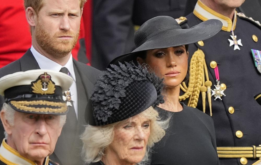 Britain's King Charles III, from bottom left, Camilla, the-then Queen Consort, Prince Harry and Meghan, Duchess of Sussex attend the state funeral service of Queen Elizabeth II in Westminster Abbey, London,  on Sept. 19, 2022.