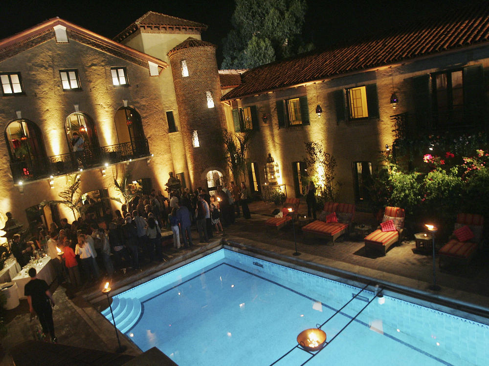 A new research study says that maintaining backyard pools, like this one pictured in Los Angeles in August, 2005, are one way that rich city dwellers are over-consuming water.