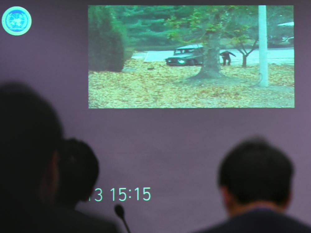 Surveillance footage of the moment a North Korean soldier defects, shown at a press briefing by the United Nations Command at the Defense Ministry in Seoul on Nov. 22, 2017. A North Korean soldier crossed the border into the South in breach of a 1953 armistice agreement, as he pursued a defector who was shot last week, the United Nations Command said.