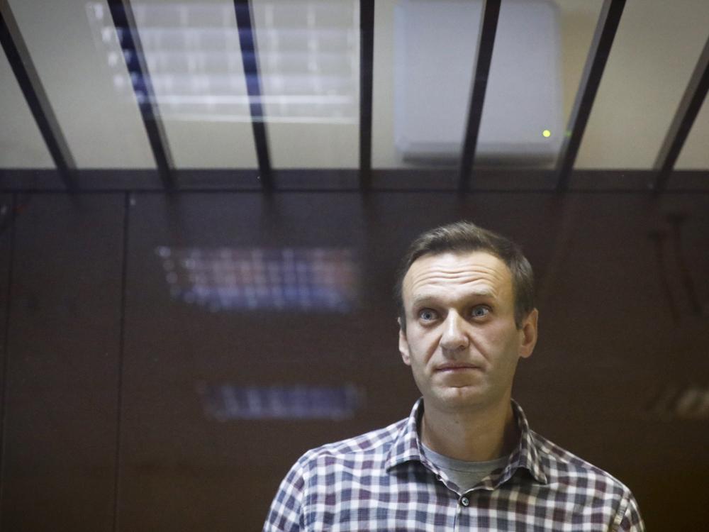 Imprisoned Russian opposition leader Alexei Navalny (shown here in the Babuskinsky District Court in Moscow in  February 2021) is in failing health because of a new suspected poisoning and is back in a punishment cell after a few days in regular confinement, a spokeswoman said Wednesday.