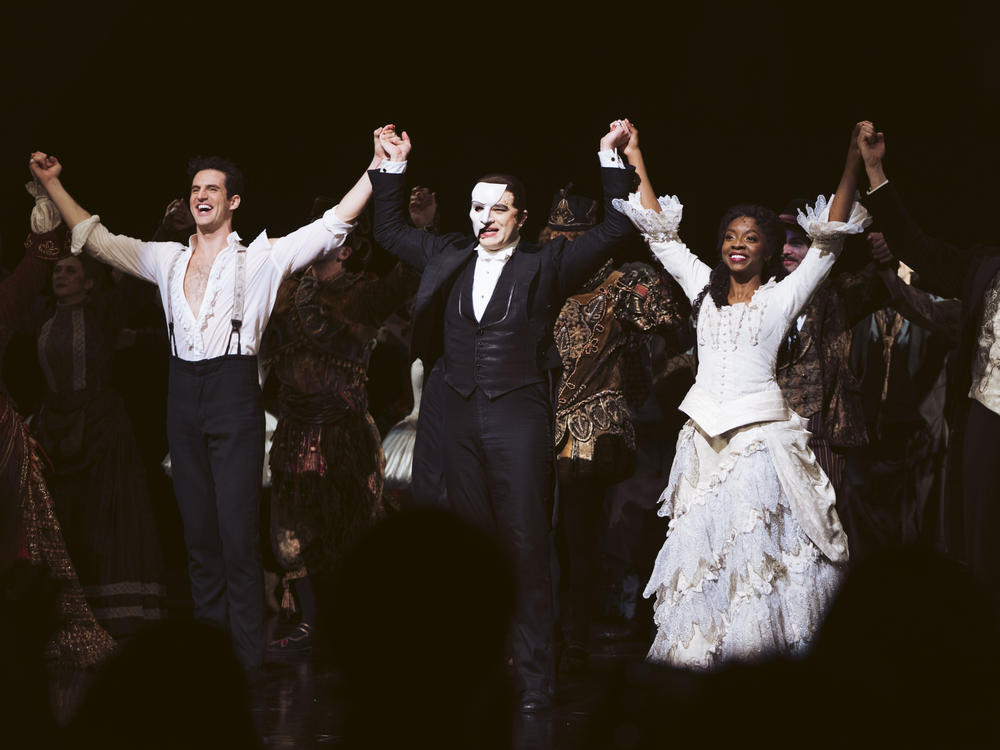 John Riddle as Raoul (left), Ben Crawford as The Phantom and Emilie Kouatchou as Christine at Broadway's 34th anniversary performance of <em>The Phantom of the Opera. </em>The last performance of the long-running hit musical will be on Sunday, April 16.