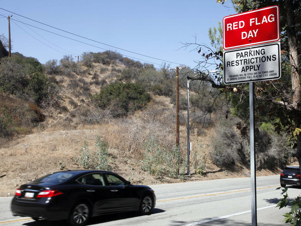 A red flag fire warning sign as seen in October 2013 in Pasadena, Calif.