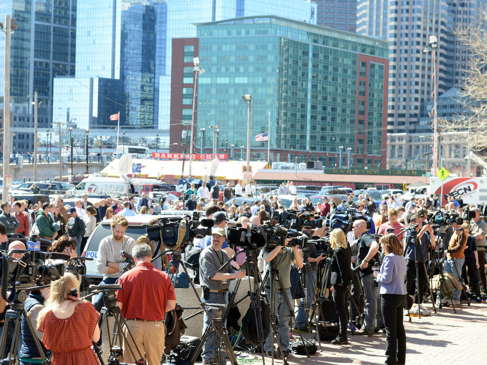 National and international media congregate in Boston, Massachusetts two days into a manhunt for two suspects behind the bombings.