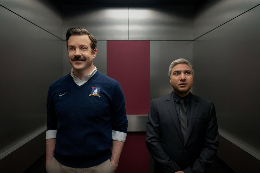 Jason Sudeikis as Ted Lasso (left) and Nick Mohammed as Nathan Shelley