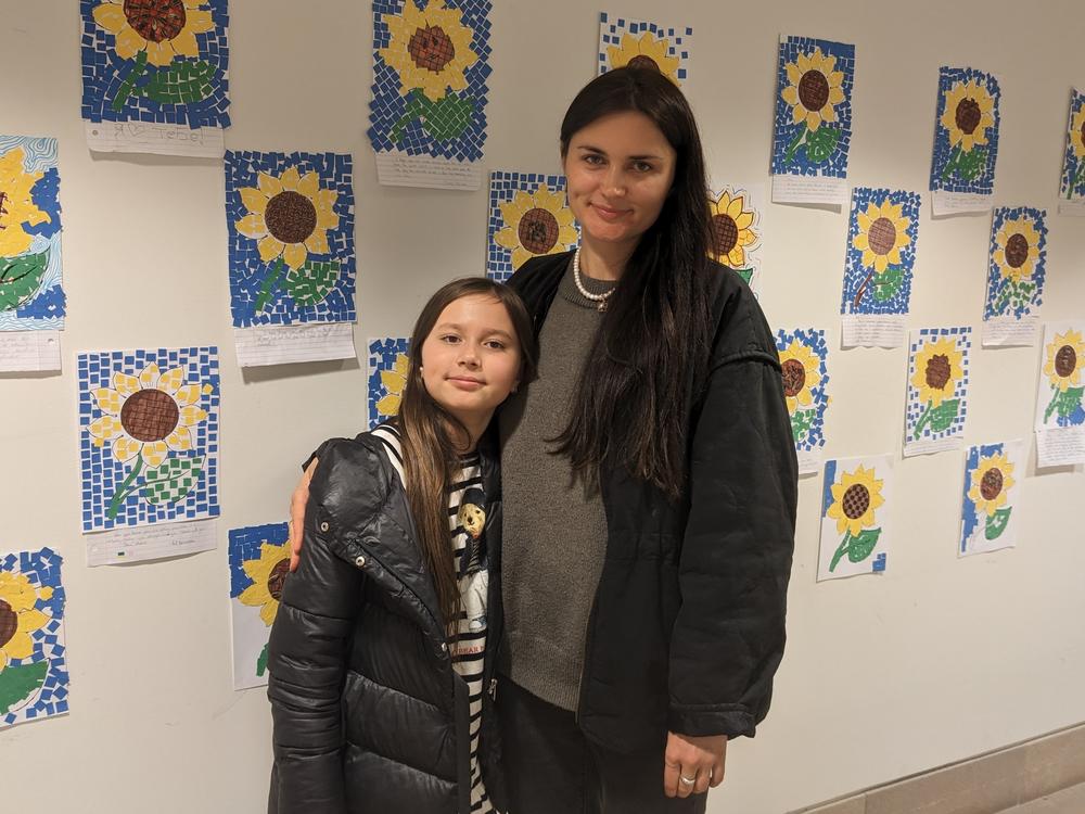 Tetiana Lytvynenko and her 9-year-old daughter Darina, seen at the Ukrainian Museum in New York City, are living rent-free with a family in Brooklyn, where they cook borsht and crepes for their hosts.