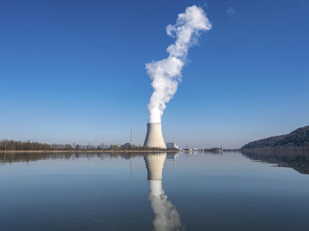 Water vapor rises from the nuclear power plant Isar II in Essenbach, Germany, on March 3, 2022.