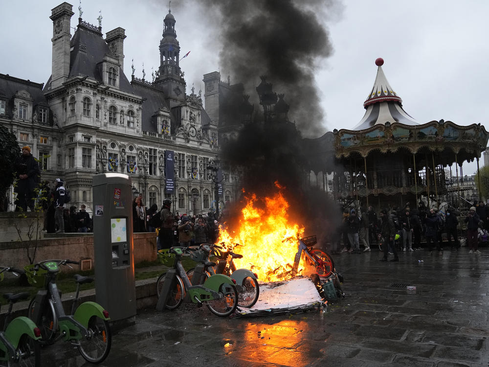 Bicycles burn during a protest outside the Paris City Hall on Friday, the day France's Constitutional Council approved an unpopular plan to raise the retirement age from 62 to 64.