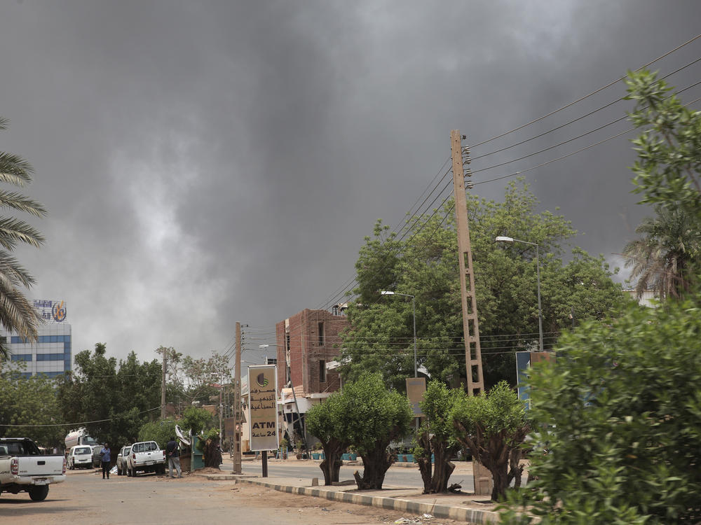 Smoke is seen rising from a neighborhood in Khartoum, Sudan, on Saturday. Fierce clashes between Sudan's military and the country's powerful paramilitary erupted in the capital and elsewhere in the African nation after weeks of escalating tensions between the two forces.
