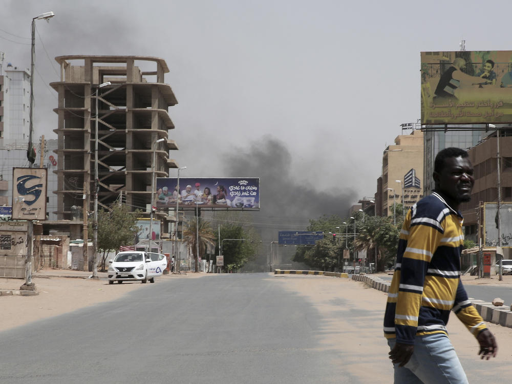 Smoke is seen rising from a neighborhood in Khartoum, Sudan, Saturday, April 15, 2023. Fierce clashes between Sudan's military and the country's powerful paramilitary erupted in the capital and elsewhere in the African nation after weeks of escalating tensions between the two forces. The fighting raised fears of a wider conflict in the chaos-stricken nation.