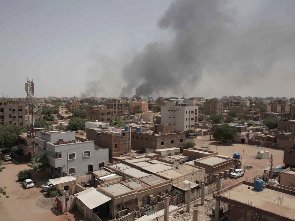 Smoke is seen rising from Khartoum's skyline, Sudan, on Sunday. The Sudanese military and a powerful paramilitary group battled for control of the chaos-stricken nation for a second day Sunday, signaling they were unwilling.