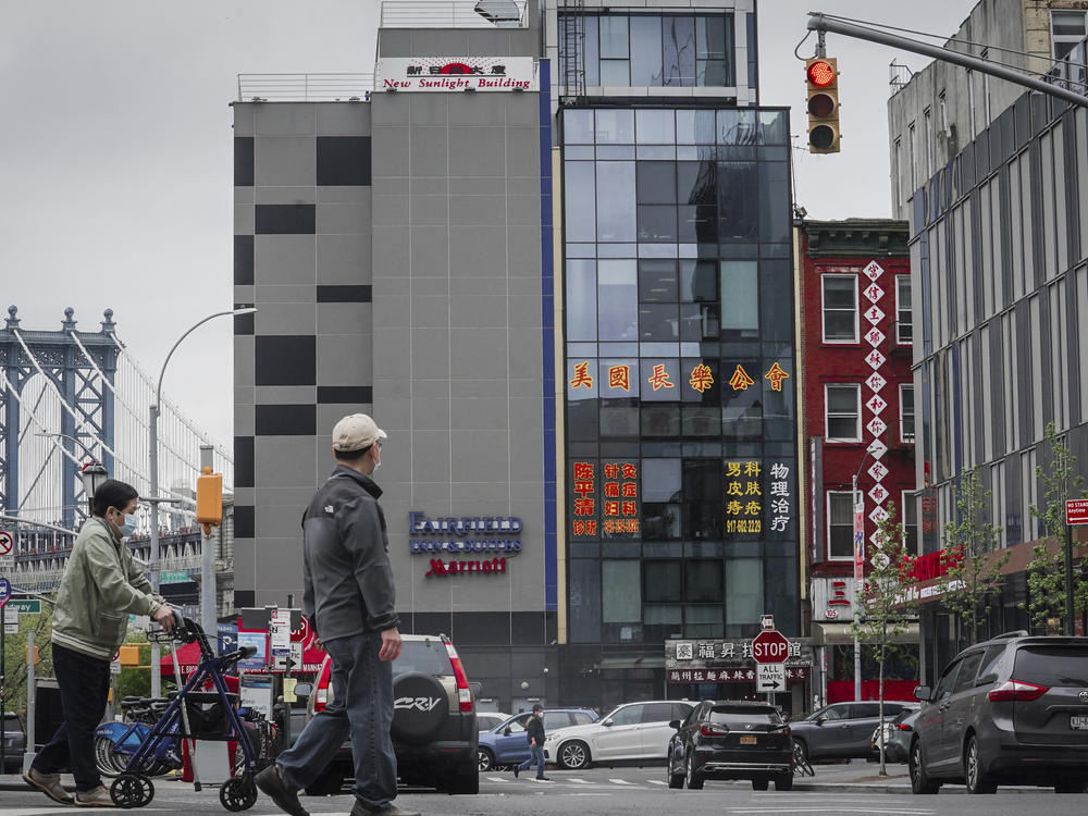 A six story glass facade building, center, is believed to be the site of a foreign police outpost for China in New York's Chinatown, Monday, April 17, 2023.