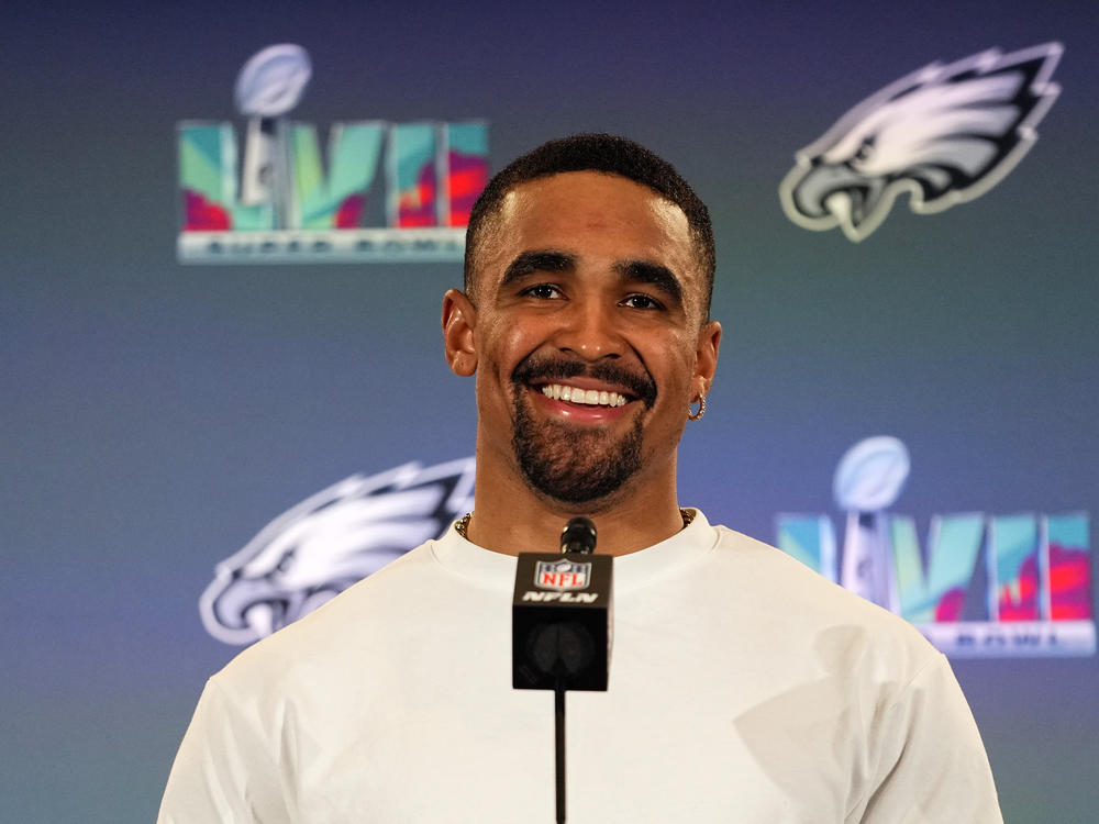 Philadelphia Eagles quarterback Jalen Hurts speaks during an NFL football Super Bowl team availability, Wednesday, Feb. 8, 2023, in Phoenix. Jalen Hurts is set to sign one of the richest deals in NFL history, agreeing to a five-year, $255 million extension with the Philadelphia Eagles, including $179.3 million guaranteed, a person with knowledge of the situation told The Associated Press.