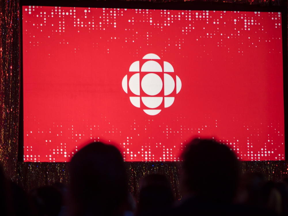 The Canadian Broadcasting Corporation logo is projected onto a screen on May 29, 2019, in Toronto.