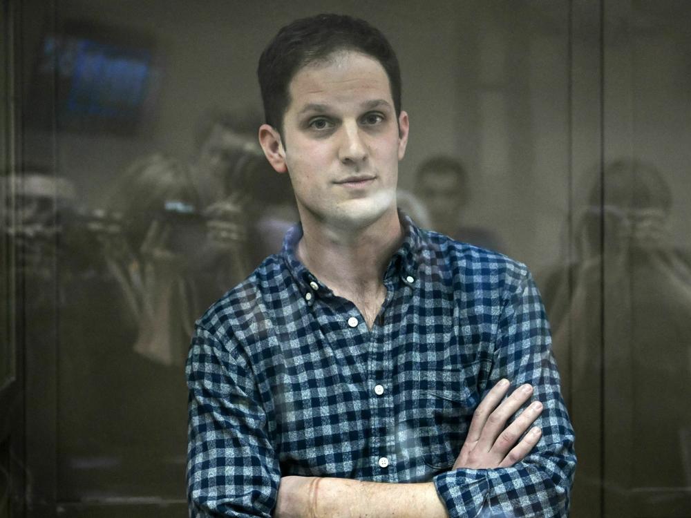 U.S. journalist Evan Gershkovich, arrested on espionage charges, stands inside a defendants' cage before a hearing to consider an appeal on his arrest at the Moscow City Court on Tuesday.