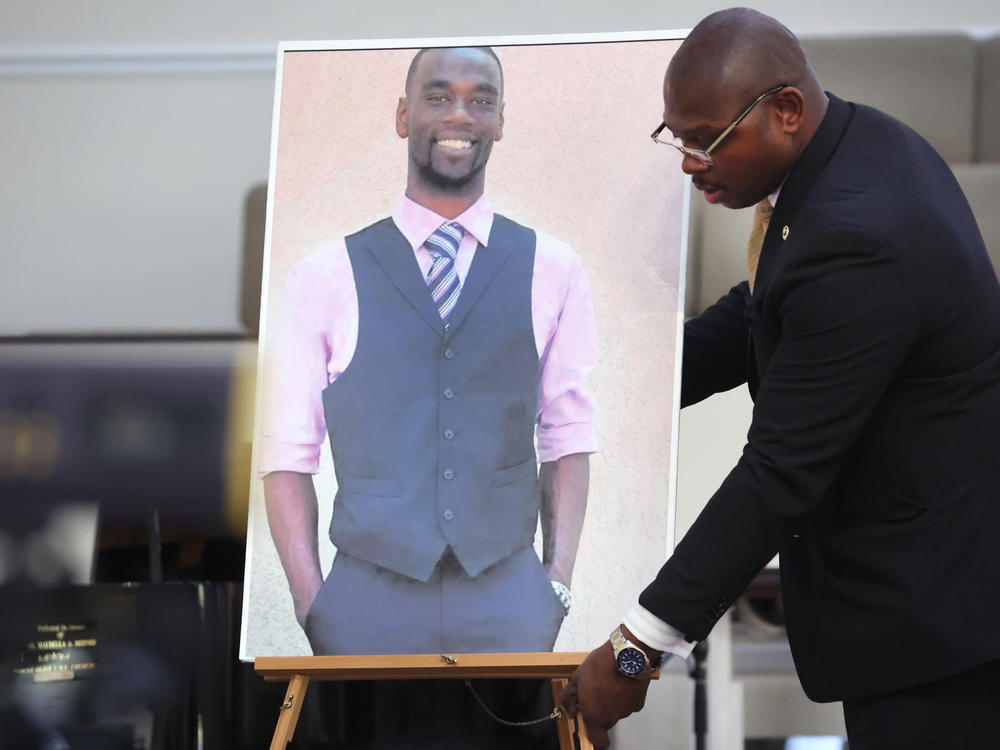 A photo of Tyre Nichols is positioned prior to a press conference on Jan. 27 in Memphis, Tenn. Attorneys representing Nichols' family announced plans to file a civil lawsuit against the city of Memphis, the city's police department, and individual officers over the 29-year-old's January death.