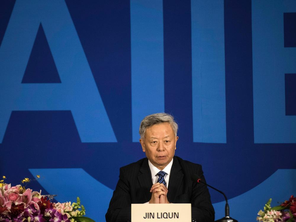 Jin Liqun, AIIB's president, addresses journalists at a Beijing press conference in 2016.