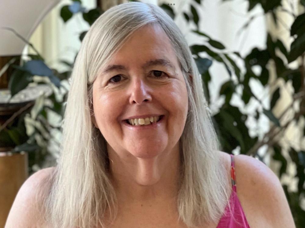 Long COVID patient Linda Rosenthal has inflammation in her chest that makes breathing difficult. The retired high school paraprofessional had trouble getting a cardiologist to see her.