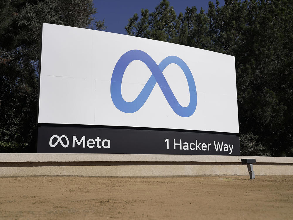Facebook's Meta logo sign at the company headquarters in Menlo Park, Calif., in 2021. Anyone in the U.S. who has had a Facebook account at any time since May 24, 2007, can now apply for their share of a $725 million privacy settlement that parent company Meta has agreed to pay. Meta is paying to settle a laws