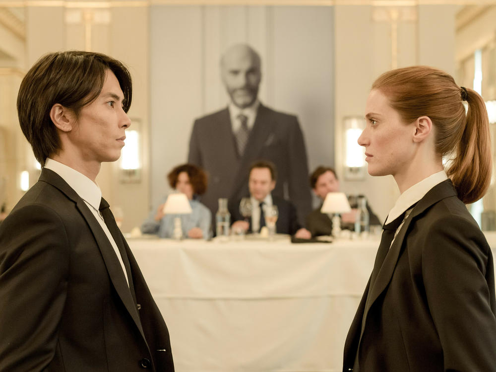 Issei (Tomohisa Yamashita) and Camille (Fleur Geffrier) compete to inherit a 87,000-bottle wine cellar worth nearly $150 million in <em>Drops of God.</em>