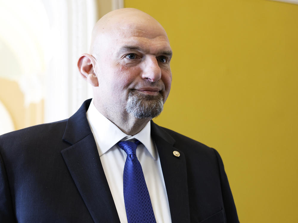 Sen. John Fetterman (D-PA) speaks to reporters on the way to the weekly Senate Policy Luncheons at the U.S. Capitol Building on April 18, 2023 in Washington, DC.