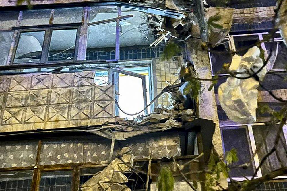This photo taken Friday shows a damaged apartment building near the site of the explosion in Belgorod.