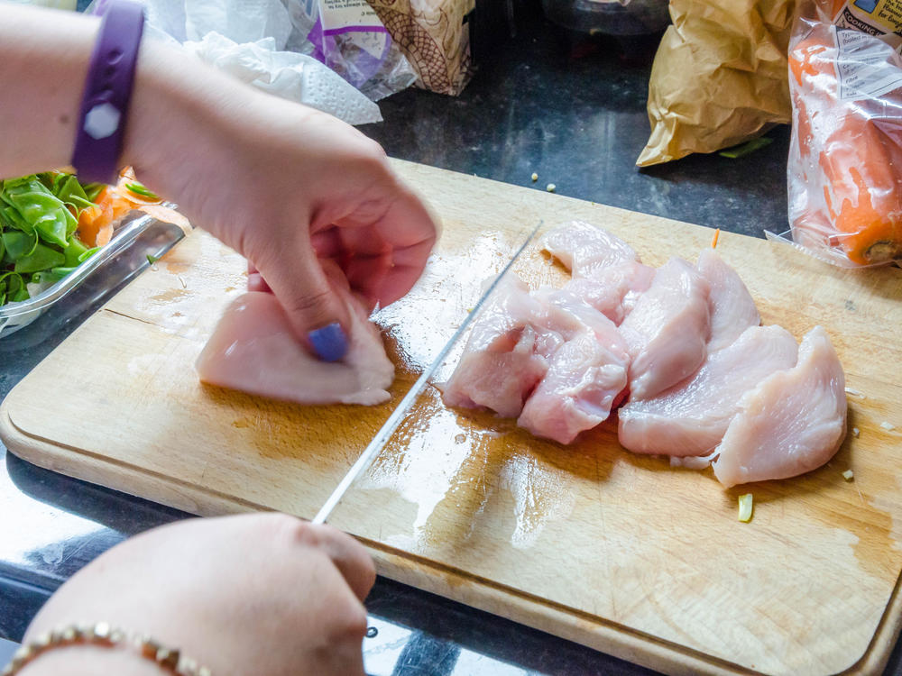 Be careful with how you handle raw meat, to prevent infection by foodborne <em>E. coli</em>.