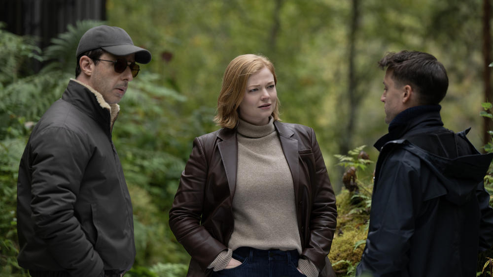 Kendall (Jeremy Strong), Shiv (Sarah Snook) and Roman (Kieran Culkin). You can really notice in this scene how putting them outside walking in the lush woods makes this conversation seem warmer.